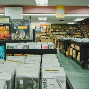 Inside of Canterbury Records are shelves of CDs to browse.