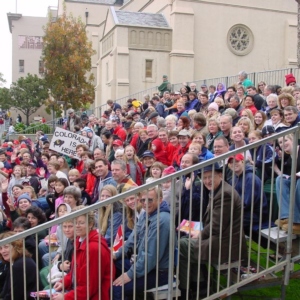 Crowd in bleacher seating at Pasadena Presbyterian Church for the Rose Parade