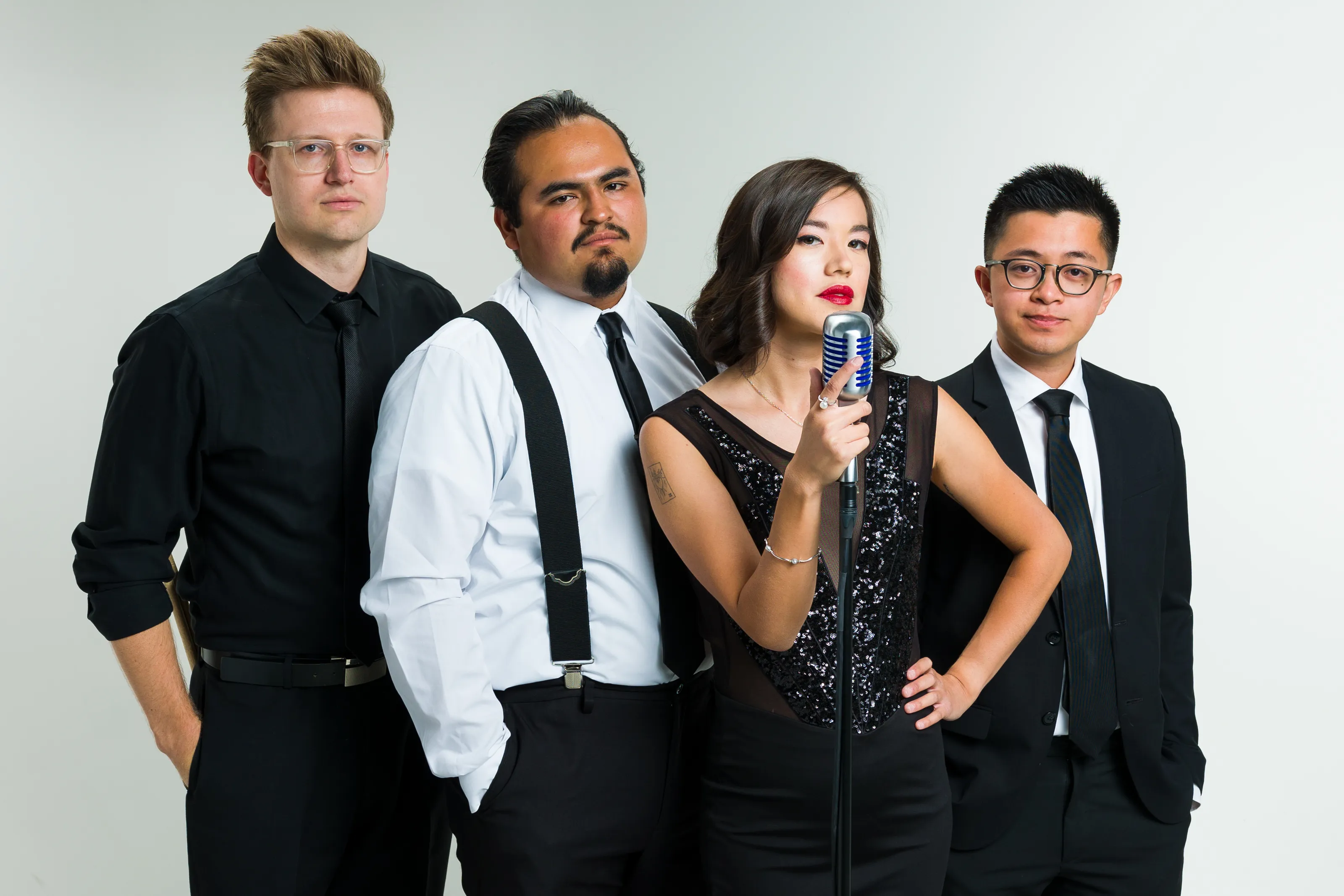 Kira and the Major 3 band photo while wearing formal wear