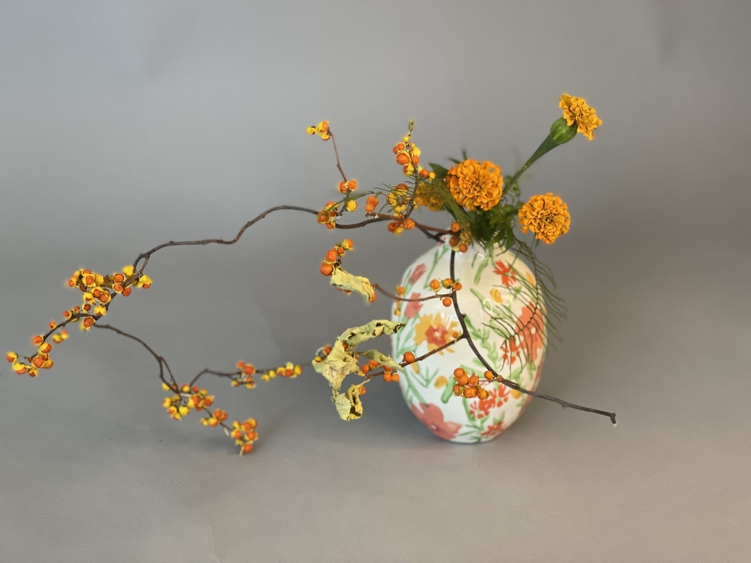 Ikebana autumn blooms in a vase